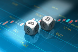 Würfel mit Bitcoin Logo auf Trading Chart